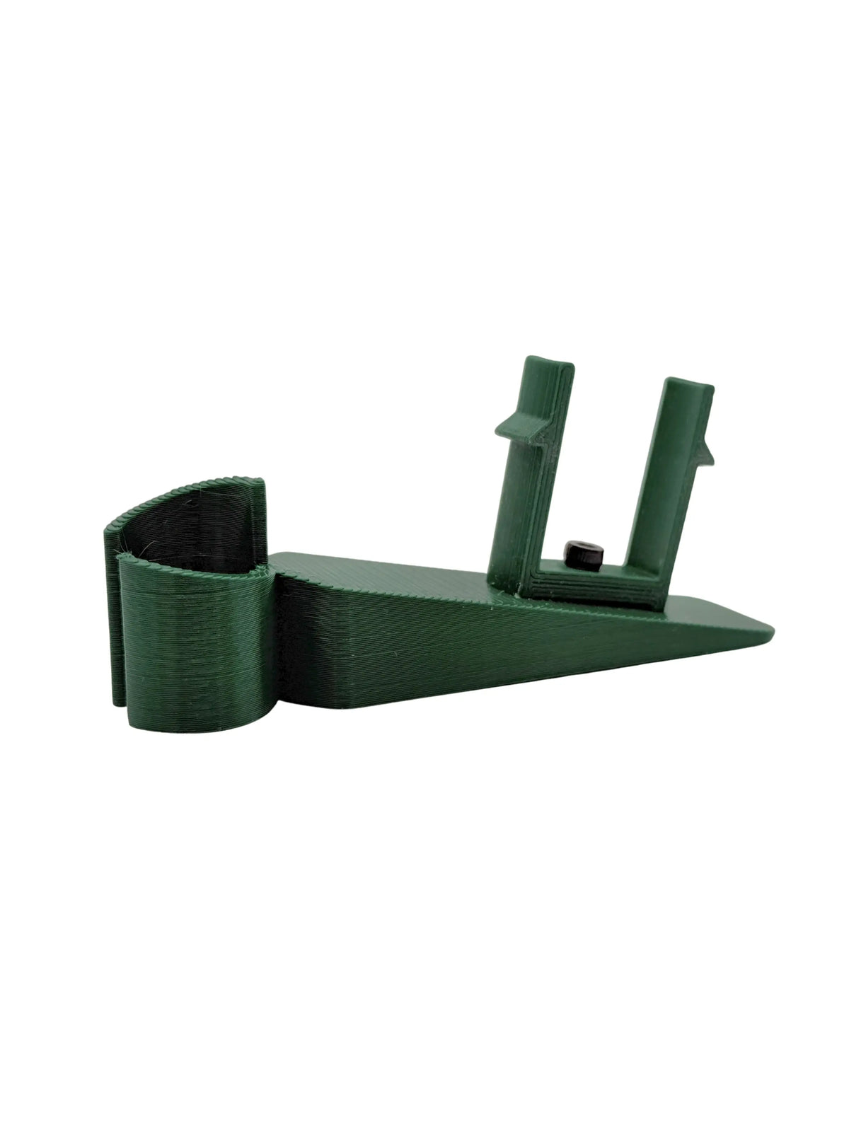 Green 3D printed plastic wedge tool on white background